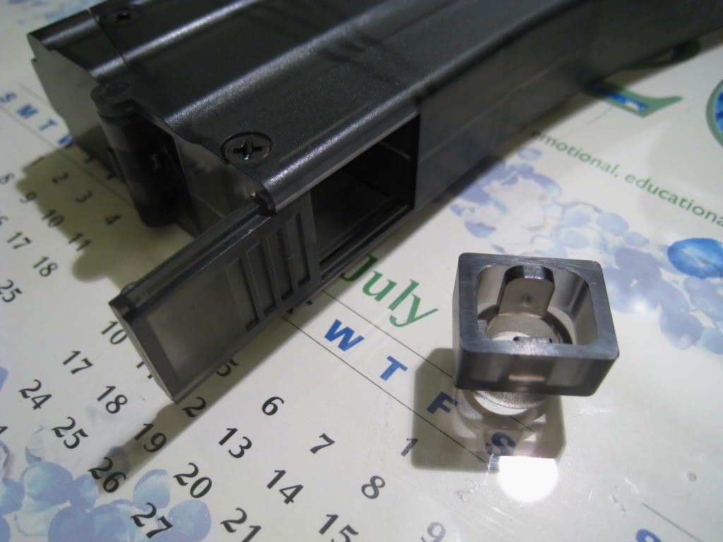 http://i8.photobucket.com/albums/a1/aznriptide859/Airsoft/KWA Magazine Speed Loader/IMG_1378.jpg